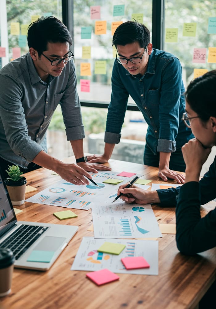 Product development consulting team reviewing strategy